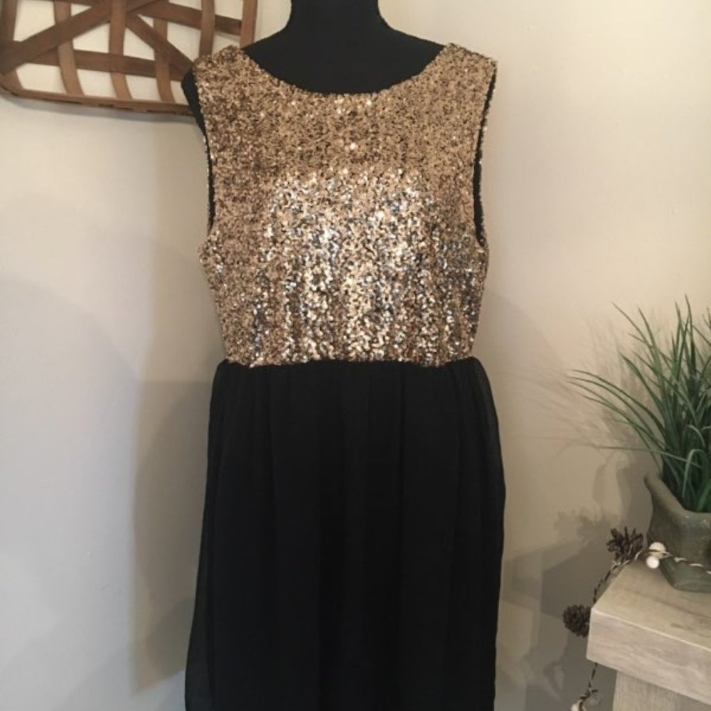 Pinky Dress, size XL.  Black bottom half with Gold Sequin top part